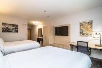 Double Room with Two Queen Beds and Mobility Accessible Roll In Shower - Non-Smoking