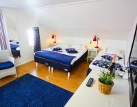 Camera Quadrupla con Bagno in Comune