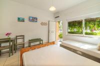 Habitación Triple Estándar con vistas parciales al mar