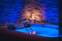 Suite mit Queensize-Bett und Whirlpool