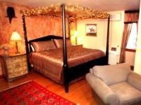 Suite mit Kingsize-Bett mit Whirlpool