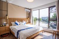 Kamer met Kingsize Bed en Uitzicht op Meer