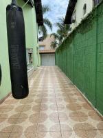 Casa na praia de Bertioga com Pscina e Churrasqueira - até 10 Pessoas - B&B Bertioga