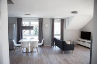 B&B Trossingen - moderne Neubau-Wohnung mit Kamin und 35qm Dachterrasse - Bed and Breakfast Trossingen