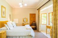 Zimmer mit Queensize-Bett und Gartenblick