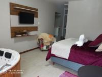 Suite mit Queensize-Bett und Whirlpool