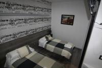 Tweepersoonskamer met 2 Aparte Bedden