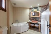Deluxe Appartement met Bubbelbad en Uitzicht op Zee
