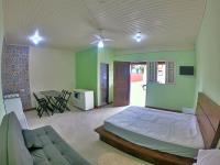 Kitnet Com Ar, em frente a Praia de Boracéia - B&B São Sebastião