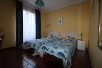 Tweepersoonskamer met 2 Aparte Bedden en Gedeelde Badkamer