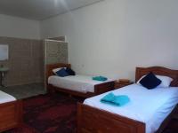 Dreibettzimmer mit Bergblick
