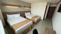 Kamar Deluxe Double dengan 2 Tempat Tidur Double