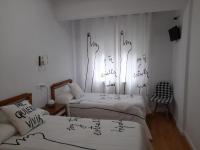 Camera Doppia con Letti Singoli