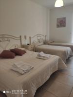 Chambre Quadruple avec Balcon
