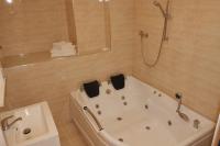 Chambre Lit King-Size avec Baignoire Spa