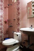 Vierpersoonskamer met Uitzicht op de Tuin.