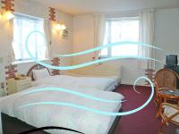 Twin Room with Sofa Bed and Sea View