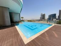RH- Modern Comfort & bright 1BR near Dubai Mall, City Views - Chambres d'hôtes Dubaï