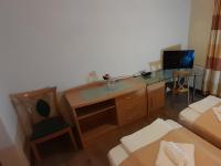 Zweibettzimmer mit Gartenblick
