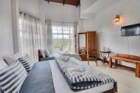 Deluxe Triple Room With Mountain View and Private Balcony