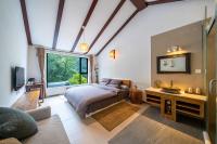 Kamer met Kingsize Bed en Uitzicht op de Bergen