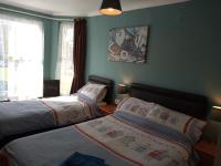 Family Room with Shared Shower (2 Adults + 1 Child)