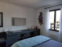 Kamer met Queensize Bed en Uitzicht op de Tuin