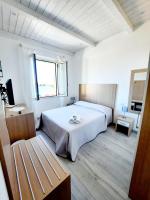Suite Lit Queen-Size – Vue sur Mer