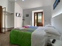 Chambre Quadruple avec Salle de Bains Privative