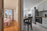One-Bedroom Apartment with Balcony and Sea View