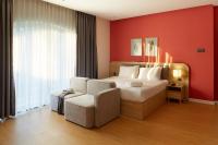 Suite mit Kingsize-Bett und Balkon
