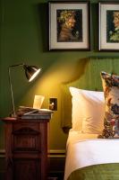 Kamer met Queensize Bed en Uitzicht op de Tuin