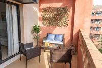 Apartamento junto a la playa con piscina y parking - B&B Punta Umbría