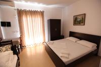 Dreibettzimmer mit Balkon