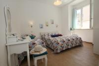 Chambre Triple avec Balcon