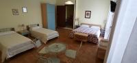 Quadruple Room with Private Bathroom