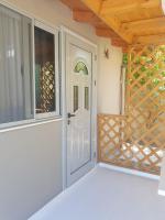 Deluxe Tweepersoonskamer met 1 of 2 Bedden en Uitzicht op de Tuin