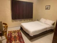 Chambre Lit King-Size - Accessible aux Personnes à Mobilité Réduite