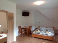 Camera Familiare con Vista Giardino