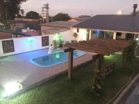 Apartamento inteiro com piscina em Balneário Pinhal - B&B Balneário Pinhal