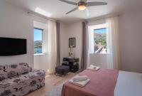 Camera Matrimoniale Deluxe (2 Adulti + 1 Bambino) 