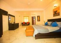 Deluxe Room with Balcony & Garden View (15% off on Food & Beverage and Early Check-in and Late Check-out on Availability Basis)