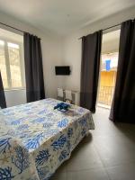 Quadruple Room with Private Bathroom