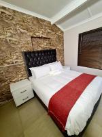 Chambre Lit Queen-Size Deluxe
