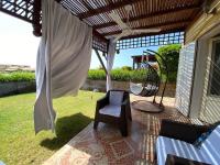 Chalet with backyard in North Coast near Marina & New Alamein الساحل الشمالي العلمين - Ferienwohnung El-Alamein