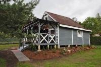 Drewniany domek nad jeziorem w Sitnie - B&B Sitno