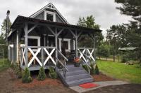 Drewniany domek nad jeziorem w Sitnie - B&B