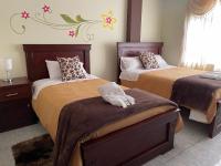 Tweepersoonskamer met 2 Aparte Bedden