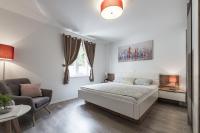Premium One-Bedroom Apartment with Balcony and Partial Sea View