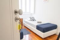 Chambre Lits Jumeaux avec Salle de Bains Commune